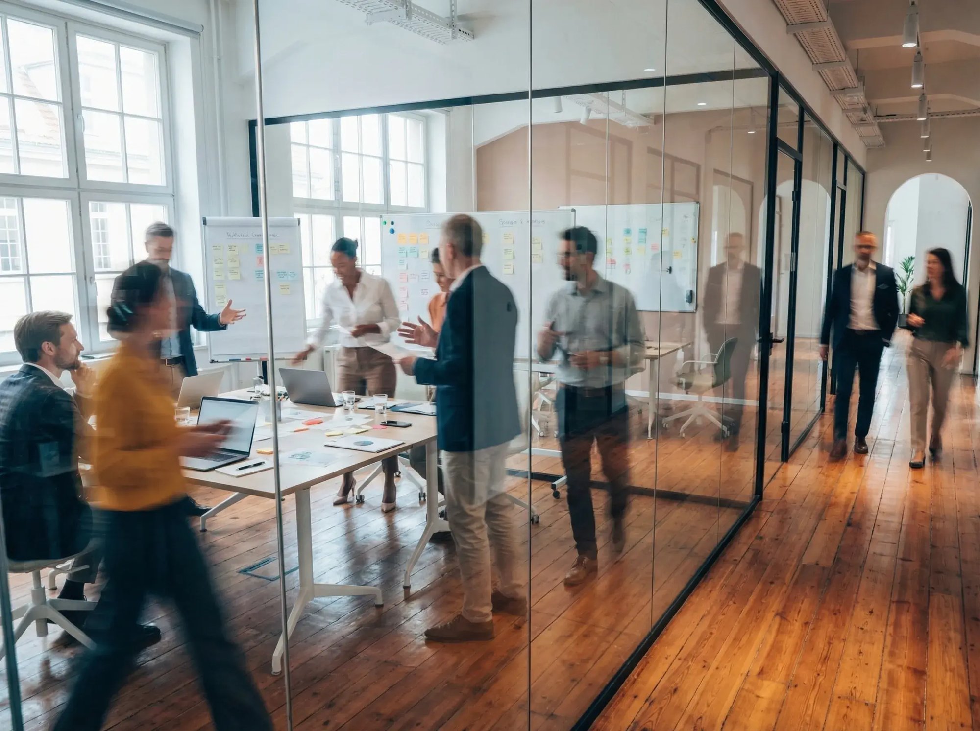 People blurry in office meeting